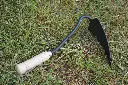 Triangular hoe with handle