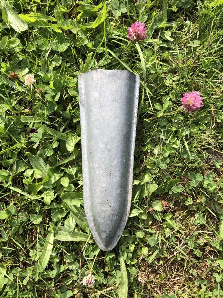 Old galvanised whetstone holder