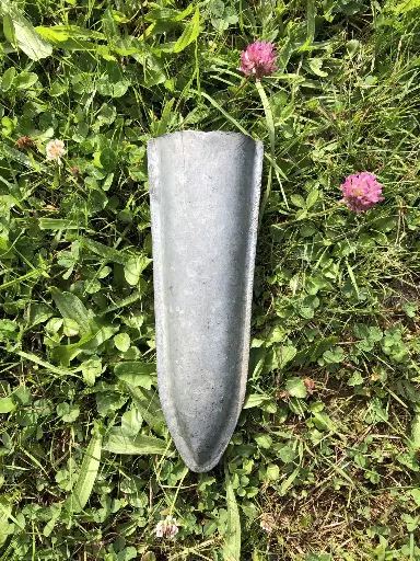 Old galvanised whetstone holder